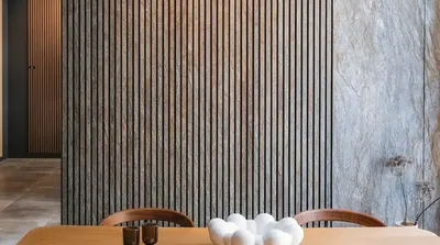 Acoustic behavior of natural stone walls and floors