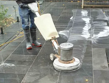 Anti-slip treatments for exterior stone areas